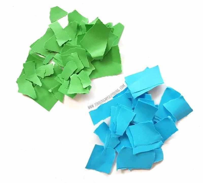 green and blue torn paper.